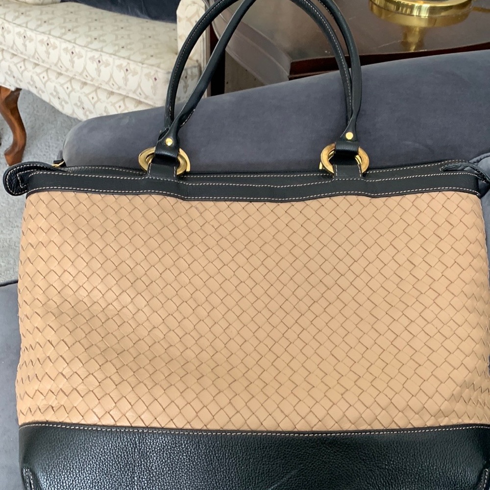 Leather Laptop bag in brand new condition. Woven leather, padded pouch